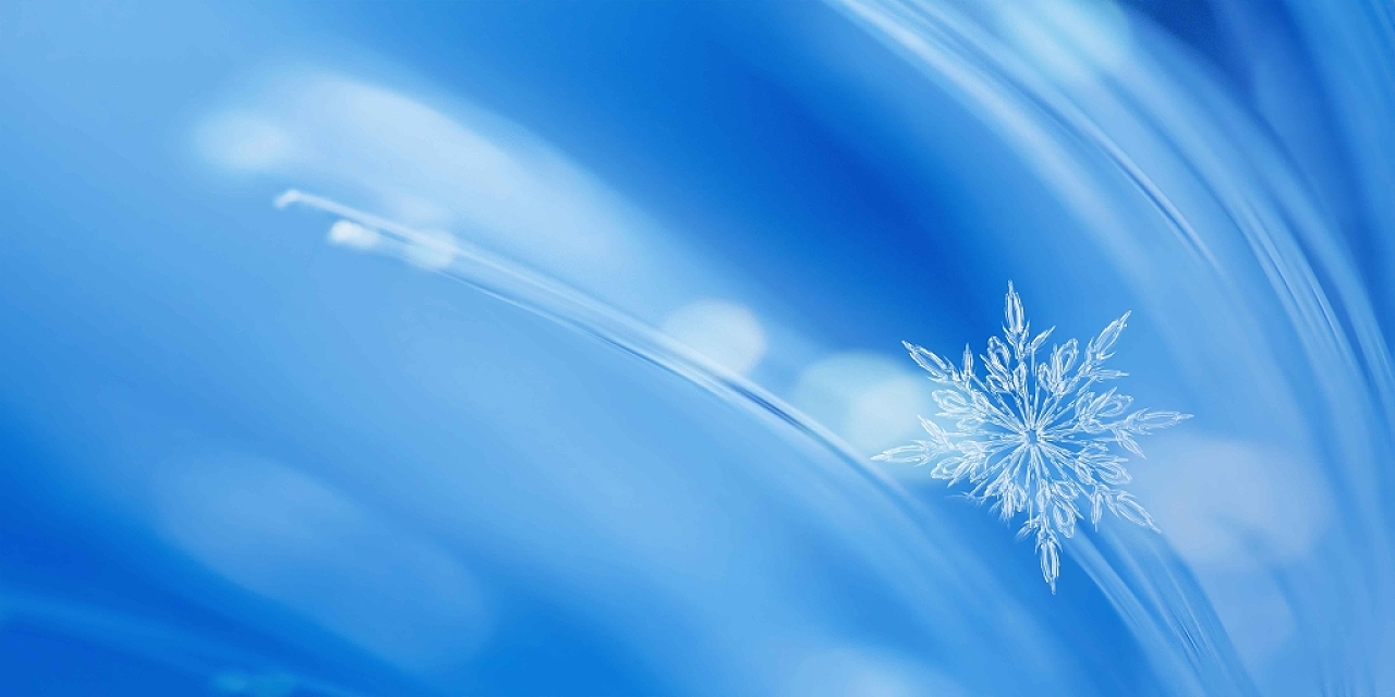 蓝色抽象小雪背景雪花光晕冬季小雪展板背景